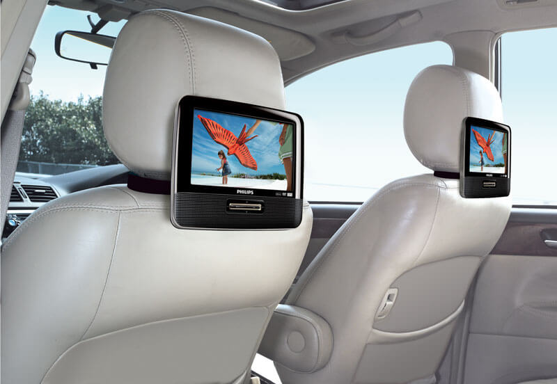 mobile video and audio player mounted on a car headrest