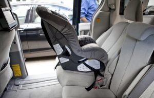 Rear facing car seat installed without covering it with a car seat protector
